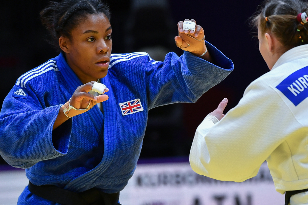 A pregnant judo athlete in a competition